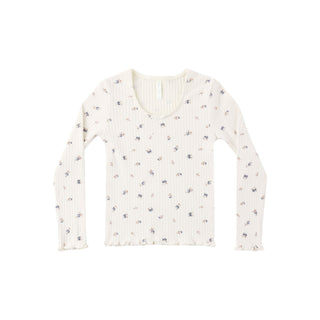 Rylee & Cru Ribbed Long Sleeve - Natural Ditsy
An off-white ribbed long-sleeve V-neck top with a small all-over floral print, shown flat against a white background.