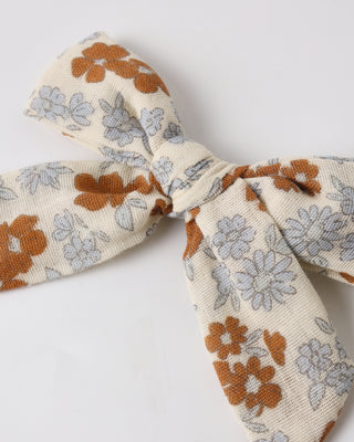 Rylee & Cru Americana Floral bow hair accessory with a natural fabric and colorful floral pattern for girls.