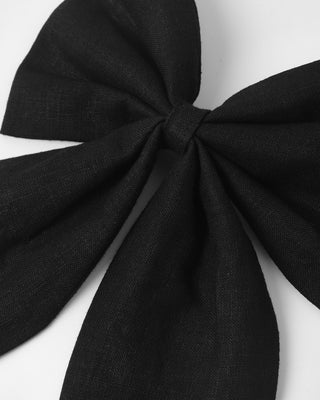 Black oversized bow hair accessory by Rylee & Cru, featuring a large, stylish bow for versatile hair styling.