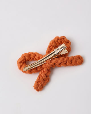 Rylee & Cru crochet bow clip set with three adorable Poppy-colored hair accessories for children.