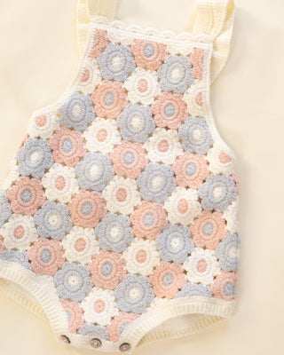 Rylee & Cru crochet romper in blue, light pink, and ivory fabric, featuring a cute, breathable design for infants or toddlers.