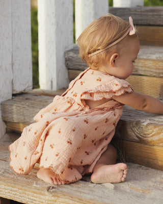 Rylee & Cru Kinsley Dress in melon, a stylish children's dress with a playful, colorful pattern and soft fabric for comfort.
