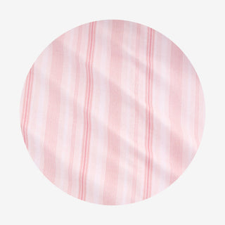 Posh Peanut Footie Ruffled Zippered One Piece - Remi
A circular fabric swatch showing a light pink and white striped pattern with soft folds, isolated on a white background.