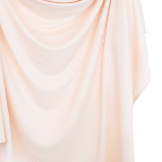 Lou Lou and Company ribbed swaddle blanket in Rosie color, soft and cozy for newborns, with a textured ribbed design.
