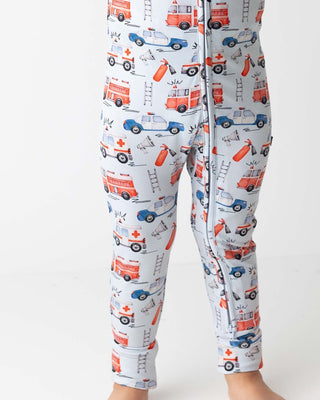 Lev Baby Poppy Convertible Zipper Romper - Ryan
Pajama pants with vehicle pattern on a white background