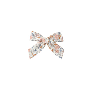 Rylee & Cru Bow - Flower Field
Floral bow hair accessory on a white background