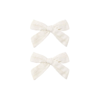 Rylee & Cru Bow Clip Set - Ivory
Two white hair bows on a white background