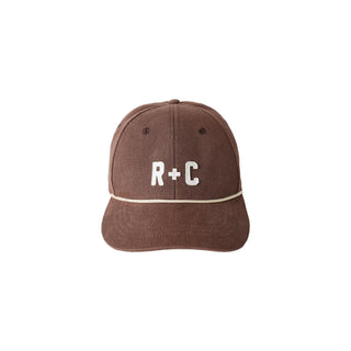 Rylee & Cru Cru Hat - Chocolate
Brown cap with 'R+C' logo on a white background