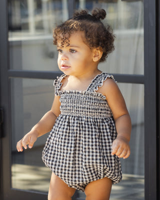 Rylee & Cru Julia Romper in black check fabric, stylish toddler romper with long sleeves and playful pattern, perfect for casual wear.