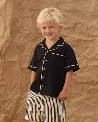 Black Rylee & Cru lapel collared shirt with button closure, displayed flat on a white background.