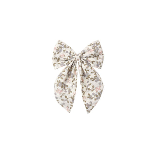 Rylee & Cru Oversized Bow - Winter Garden
A fabric hair bow with a delicate floral print in muted pink, olive green, and gray on a cream background, centered on a solid white background.