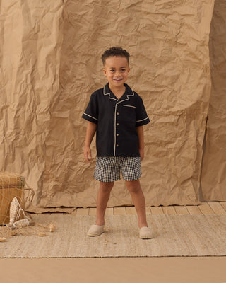 Black check Rylee & Cru Perry shorts for kids, featuring a casual, comfortable design perfect for everyday wear.