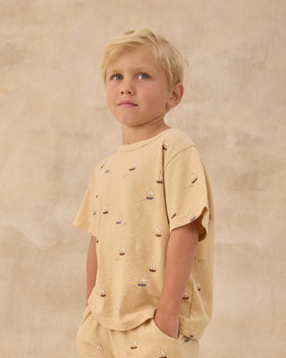 Rylee & Cru Play Set - Sailboats
Young boy wearing a beige outfit with sailboat patterns against a beige background