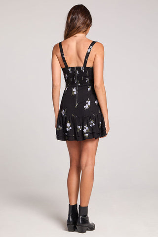 Black Saltwater Luxe Carleigh Mini Dress displayed on a hanger, showcasing its stylish design and fitted silhouette.