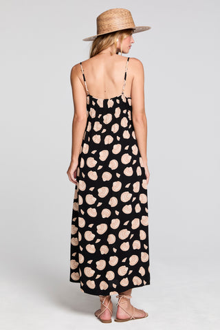 Black Saltwater Luxe Avalan Midi Dress displayed on a model, showcasing elegant, flowing design for stylish occasions.