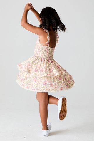 Saltwater Luxe Saltwater Littles Raynbow Mini Dress in Ivory, showing a stylish sleeveless dress with a fitted design and colorful pattern.