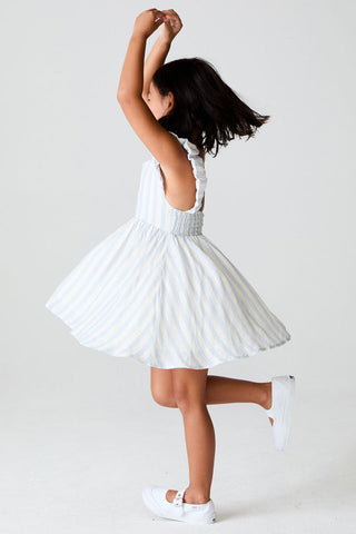 Saltwater Luxe Saltwater Littles Crocket Mini Dress in Cloud Blue, lightweight dress with a stylish design, shown on a hanger.