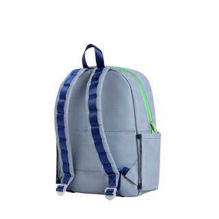 State Bags Kane Backpack - Vidoegame
A light gray backpack shown from the back, featuring dark blue padded shoulder straps, a bright green zipper, and a top carry handle, set against a plain white background.