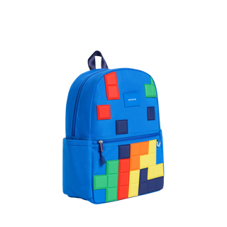 State Bags Kane Backpack - Digital Puzzle
A bright blue backpack with a colorful retro block pattern in red, green, yellow, orange, and dark blue on the front, shown on a plain white background.