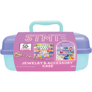 STMT Jewelry and Accessory Case A STMT Jewelry & Accessory Case set in pastel blue and purple with a pink paper label, shown on a plain white background.