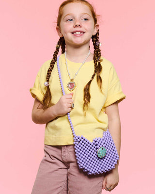 Super Smalls Mermaid Dreams Hana handbag featuring a colorful mermaid design and playful details on a vibrant background.