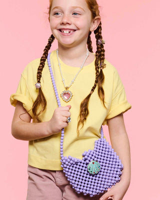 Super Smalls Mermaid Dreams Hana handbag featuring a colorful mermaid design and compact shape, perfect for stylish accessories.