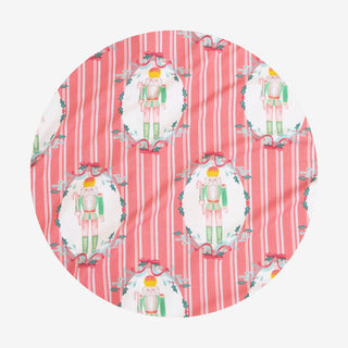 Posh Peanut Classic Pajama Set - Sable
Round placemat with nutcracker design on a red striped background