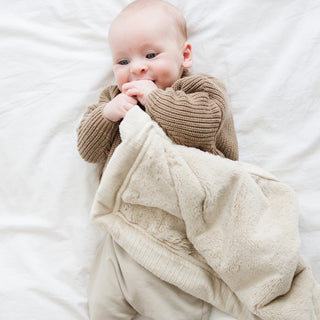 Soft Saranoni Lush Mini Blanket in Buttermilk, showcasing plush fabric and cozy texture perfect for snuggling.