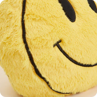 Smiley Face Warmies
Close-up of a yellow plush toy with a smiley face design.