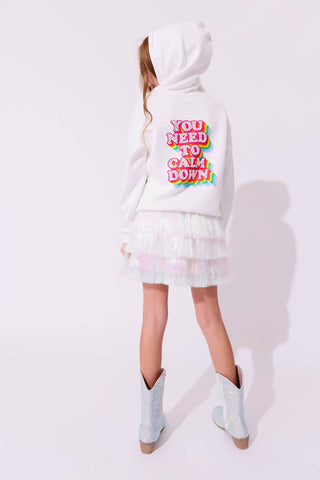 Lola and The Boys Snow Shimmer Tinsel Party Skirt
Person wearing a white hoodie with colorful text on the back, standing against a white background.