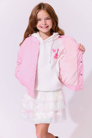 Lola and The Boys Snow Shimmer Tinsel Party Skirt
Young girl wearing a pink puffer jacket over a white hoodie and skirt on a light gray background
