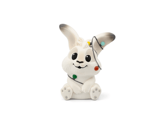 Tonies Character: Snowflake and the Missing Christmas Lights Advent Calendar
White rabbit figurine with a black hat on a white background