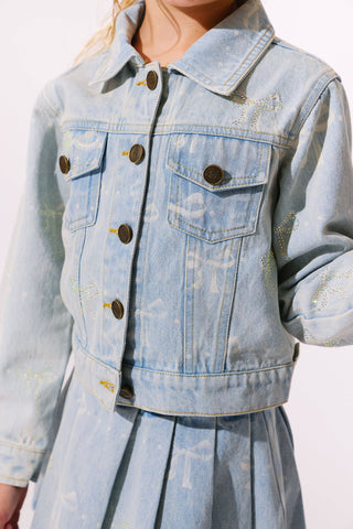 Lola and The Boys Sparkle Bows Denim Jacket
Light blue denim jacket with decorative buttons on a plain background