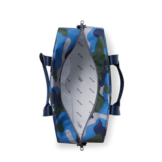 Interior view of the State Bags Rockaway Duffle in Fuzzy Bolt fabric showing spacious compartments and durable design.
