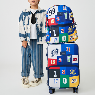State Bags Logan carry-on suitcase with varsity numbers design, featuring a durable hard shell and adjustable handle.