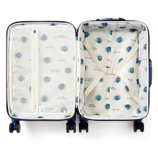 State Bags Logan carry-on suitcase with varsity number design, lightweight travel luggage for easy packing and mobility.