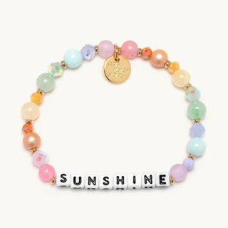 Little Words Project Bracelet - Sunshine
Colorful beaded bracelet with 'SUNSHINE' charm on a white background