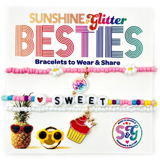 Sunshine & Glitter Besties Bracelet Set featuring colorful beaded and charm bracelets on a soft pink background.