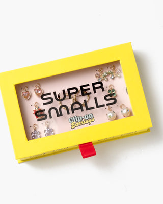 Super Smalls Absolutely Charming Clip On Earring Set
Yellow box with 'Super Smalls' and 'clip-on earrings' text, containing small earrings.