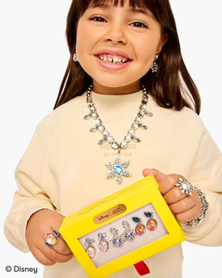 Super Smalls Disney Frozen Earring Set
Child wearing sparkling jewelry set with a yellow box featuring Disney logo.
