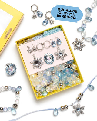 Super Smalls Disney Frozen Elsa DIY Jewelry Kit
Jewelry set with clip-on earrings and beads in a yellow box, featuring 'Ouchless Clip-On Earrings!' text.
