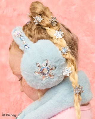 Super Smalls Disney Frozen Elsa Earmuffs
Person wearing light blue fuzzy earmuffs with snowflake designs on a pink background