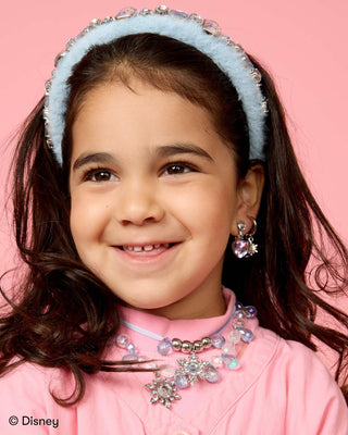 Super Smalls Disney Frozen Elsa Snowflake Sparkle Headband
Young girl wearing a pink outfit with jewelry against a pink background