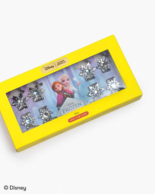 Super Smalls Disney Frozen Snowflake Hair Clips Set of earrings in a yellow box with 'Frozen' theme, featuring Disney branding.