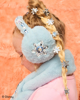 Super Smalls Disney Frozen Snowflake Hair Clips
Person wearing a light blue fuzzy headband with snowflake decorations on an orange background