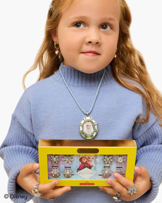 Super Smalls Disney Frozen Snowflake Hair Clips
Child holding a Frozen jewelry set with a yellow box on a white background