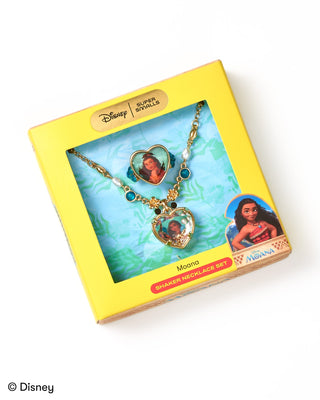 Super Smalls Disney Moana Shaker Necklace Set 
Disney Moana silver necklace set in its original yellow packaging box, featuring a heart-shaped pendant with a photo insert and a silver chain with matching heart charms.
