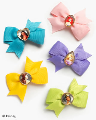 Super Smalls Disney Princess 5 Piece Mini Hair Bows
Five colorful hair bows with princess charms on a white background, featuring Disney branding.