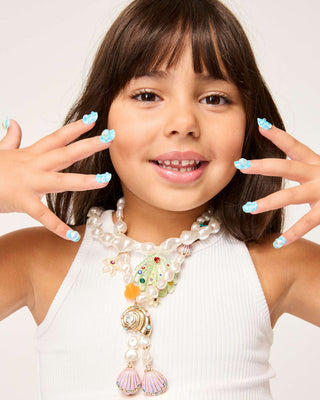 Super Smalls Mermaid Press On Nail Kit
Young girl with colorful nail polish and a necklace, against a plain background