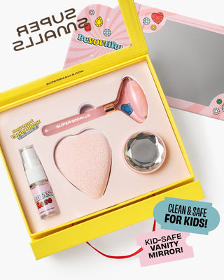 Super Smalls Mom's Beauty Starter Kit
Pink vanity mirror set with accessories in a yellow box, labeled 'Super Smalls'.